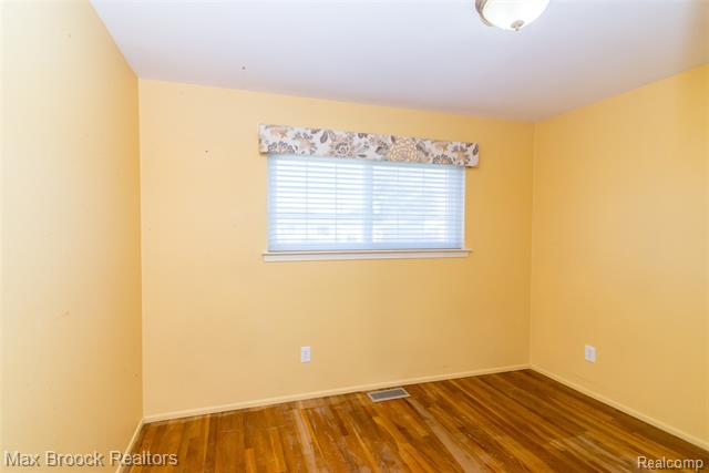 Builiding view nine for 14411 Nola, Livonia, MI. 48154