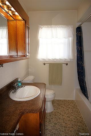 Builiding view eighteen for 8563 Cavell, Westland, MI. 48185