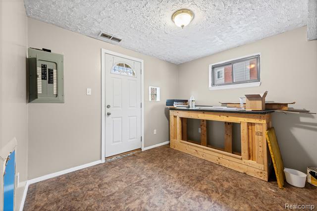 Builiding view sixteen for 31015 Mackenzie, Westland, MI. 48185