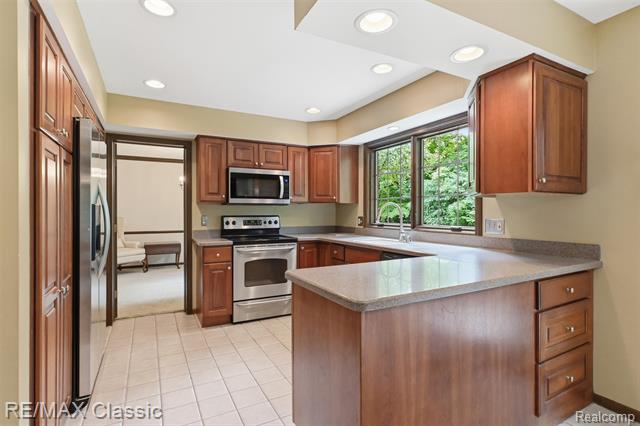 Builiding view eleven for 45451 Woodleigh Way, Plymouth, MI. 48170