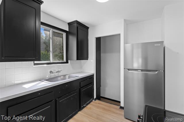 Builiding view nine for 18580 Washtenaw, Harper Woods, MI. 48225