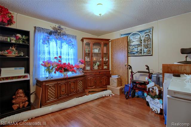 Builiding view twenty for 48620 Wear, Belleville, MI. 48111