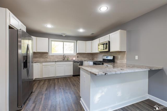 Builiding view ten for 30348 W Huron River, Flat Rock, MI. 48134