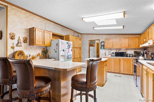 Builiding view fourteen for 19074 Sumpter, Belleville, MI. 48111