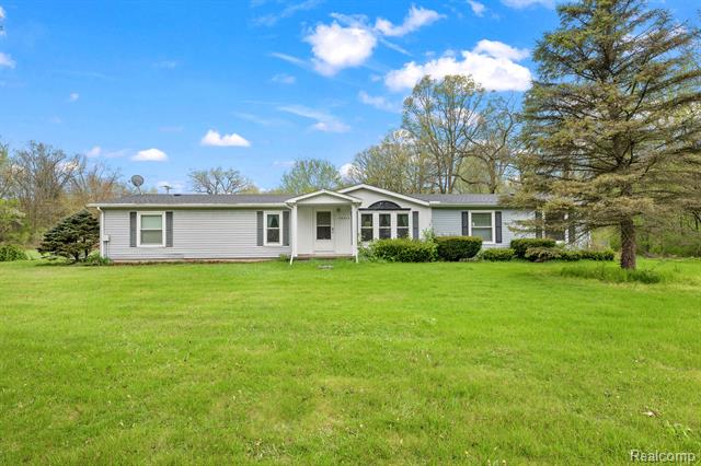 front view for 19074 Sumpter Rd, Belleville, Mi. 48111
