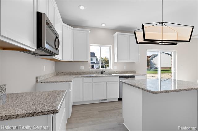 Builiding view eighteen for 23188 Waterview, New Boston, MI. 48164