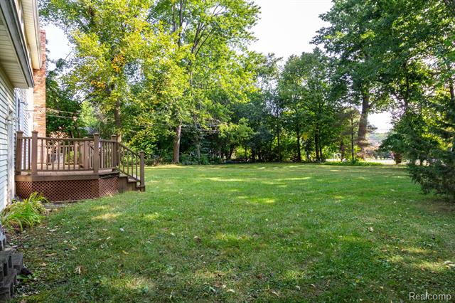 Builiding view forty for 22133 Meridian, Grosse Ile, MI. 48138