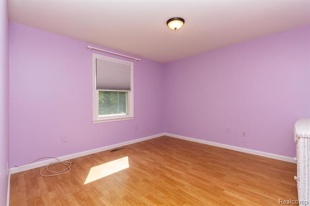 Builiding view twenty five for 22133 Meridian, Grosse Ile, MI. 48138