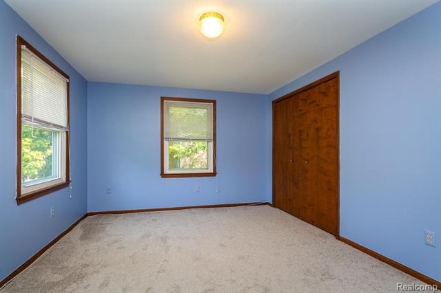 Builiding view twenty one for 22133 Meridian, Grosse Ile, MI. 48138