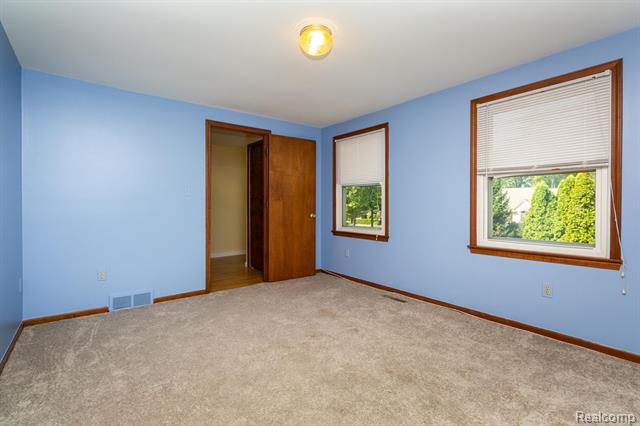 Builiding view twenty two for 22133 Meridian, Grosse Ile, MI. 48138