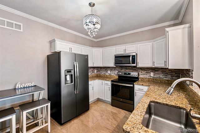 Builiding view twelve for 43046 Strand, Sterling Heights, MI. 48313