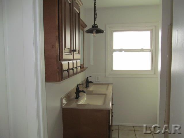 Builiding view eleven for 1062 Oram Dr, Adrian, MI. 49221