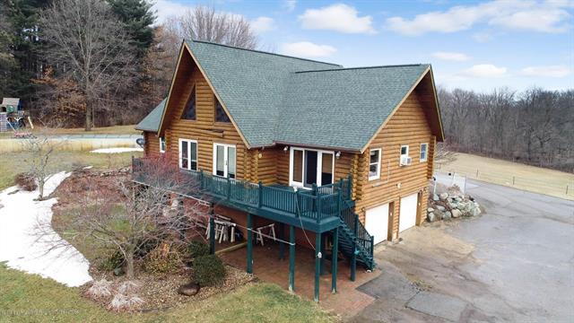 front view for 4300 Meridian Road, Leslie, Mi. 49251