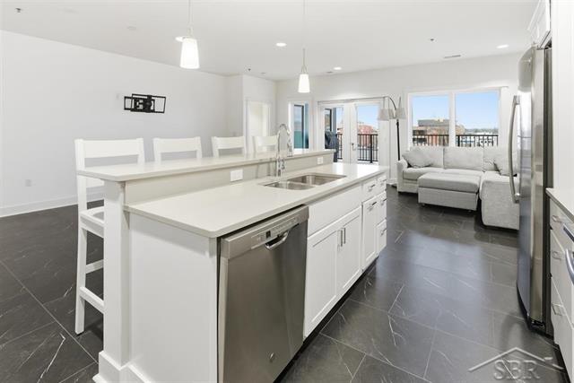 Builiding view ten for 201 Ellsworth St Unit #302, Midland, MI. 48640