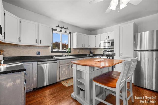 Builiding view thirty two for 7658 Jackson, Saranac, MI. 48881