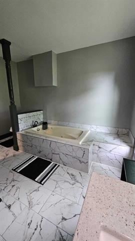 Builiding view four for 238 Maple Rd, Quincy, MI. 49082