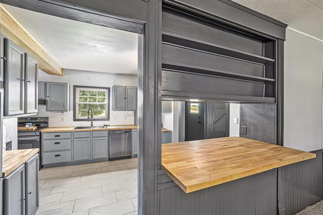 Builiding view nine for 238 Maple Rd, Quincy, MI. 49082