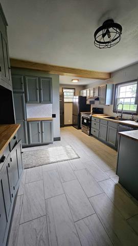 Builiding view two for 238 Maple Rd, Quincy, MI. 49082