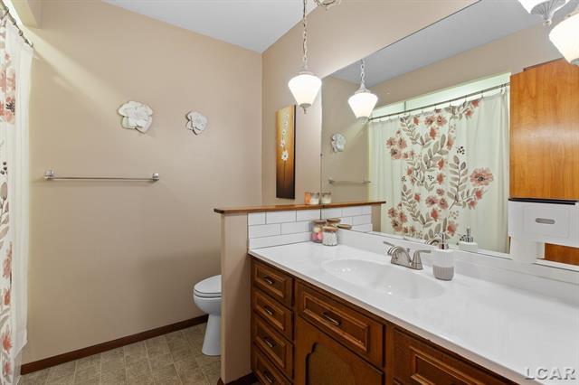 Builiding view twenty five for 108 River Drive, Blissfield, MI. 49228