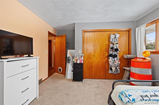 Builiding view twenty four for 108 River Drive, Blissfield, MI. 49228