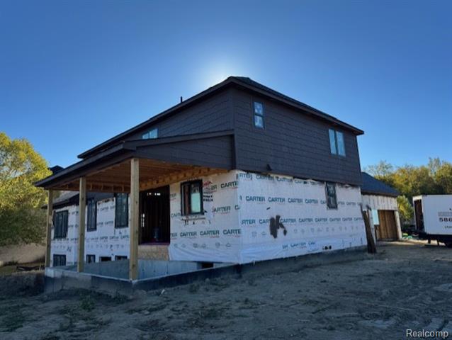 Builiding view six for 6489 Pond Dr, Washington, MI. 48094