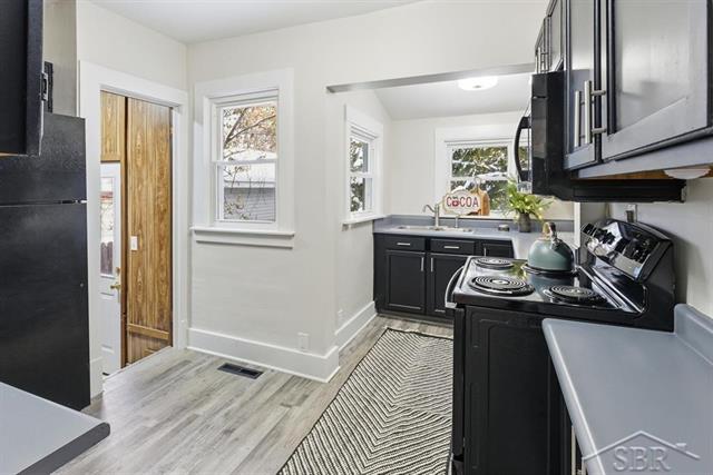 Builiding view twelve for 1605 Hines St, Midland, MI. 48640