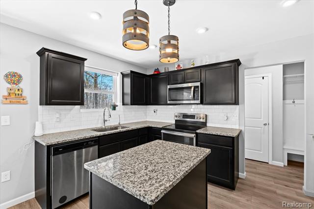 Builiding view eight for 220 Laura, Linden, MI. 48451