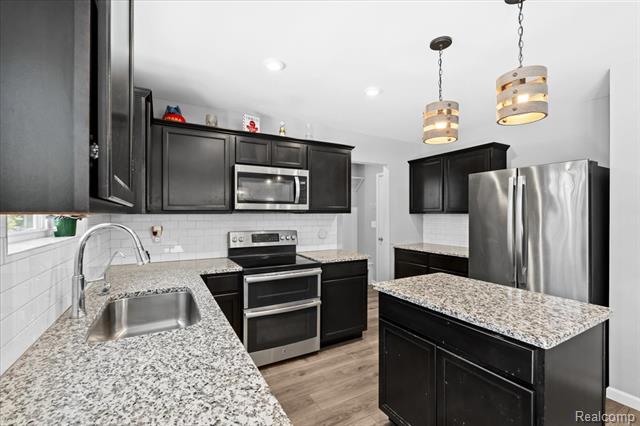 Builiding view nine for 220 Laura, Linden, MI. 48451