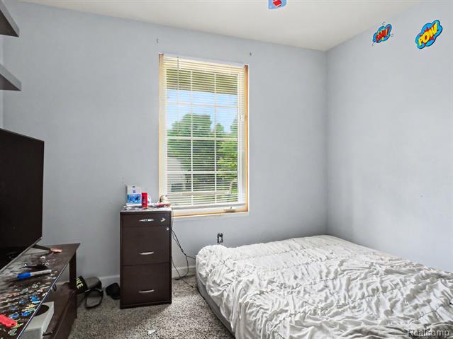 Builiding view eleven for 428 Carrie Drive, Flushing, MI. 48433
