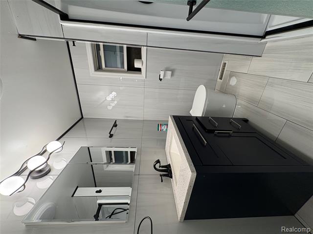 Builiding view eleven for 2374 Bradford Drive, Flint, MI. 48507