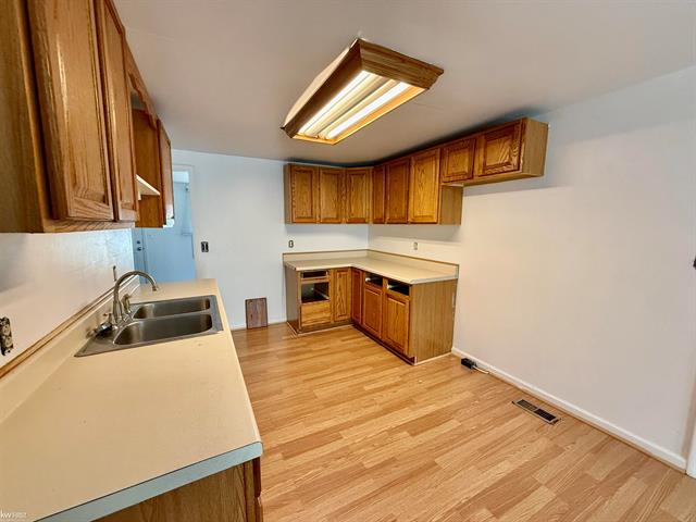 Builiding view ten for 1186 Decamp Street, Burton, MI. 48529