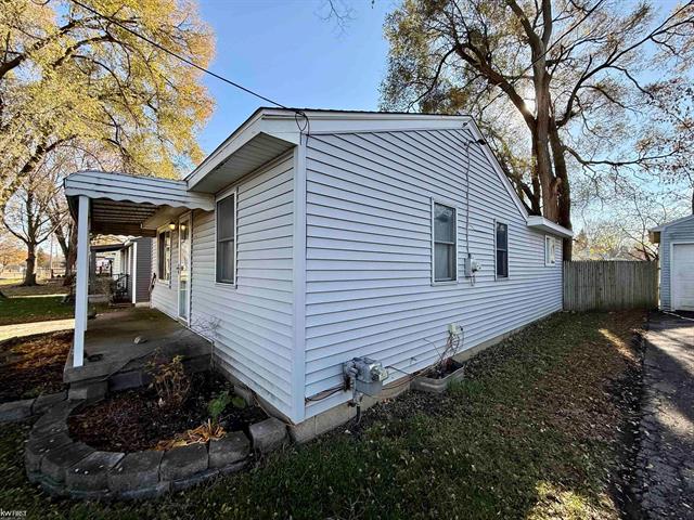 Builiding view three for 1186 Decamp Street, Burton, MI. 48529