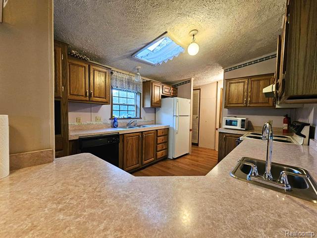 Builiding view five for 6392 Lake Rd, Millington, MI. 48746