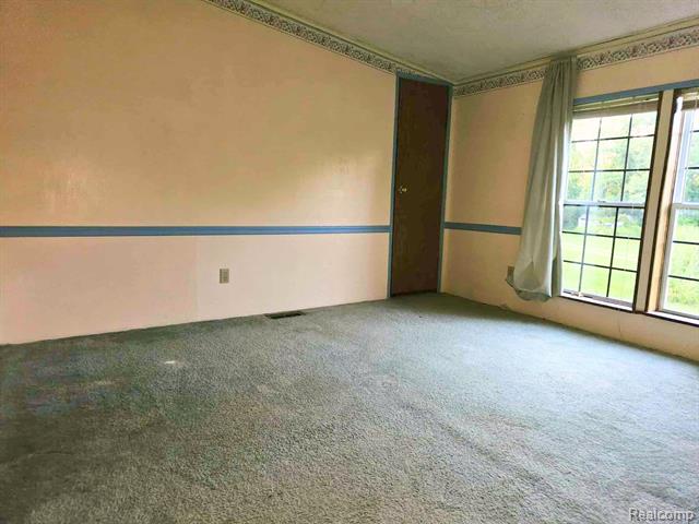 Builiding view ten for 6392 Lake Rd, Millington, MI. 48746