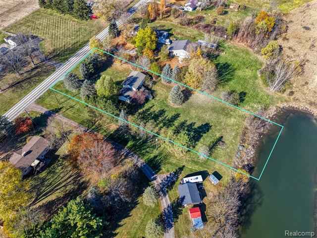 Builiding view twenty seven for 5670 Fowlerville Rd, Fowlerville, MI. 48836