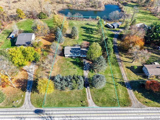 Builiding view twenty two for 5670 Fowlerville Rd, Fowlerville, MI. 48836