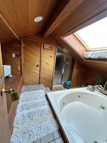 Builiding view sixteen for 5830 Shanty Creek Rd, Bellaire, MI. 49615