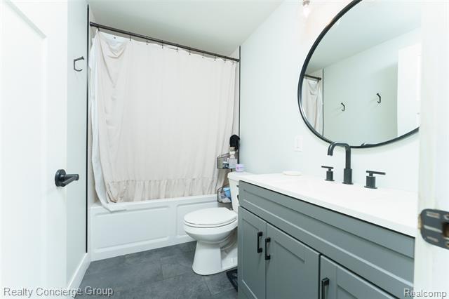 Builiding view eleven for 104 John, Durand, MI. 48429