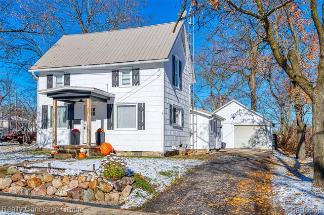 Builiding view one for 104 John, Durand, MI. 48429