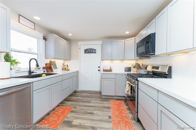 Builiding view three for 104 John, Durand, MI. 48429