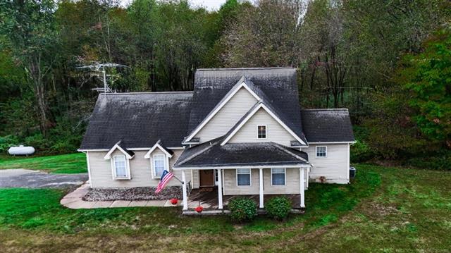 Builiding view ten for 3955 Hogback, Fowlerville, MI. 48836