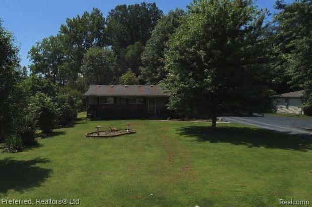 front view for 14080 Lenmoore Road, Belleville, Mi. 48111