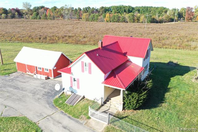 Builiding view fifty for 5537 Old State, North Branch, MI. 48461