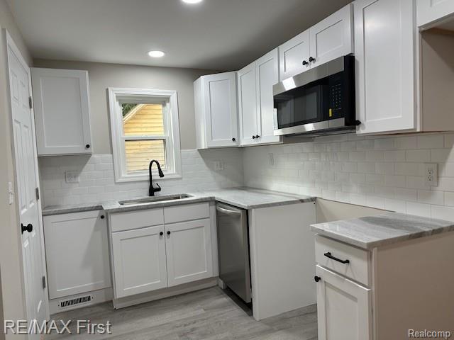 Builiding view nine for 35487 Glover, Wayne, MI. 48184