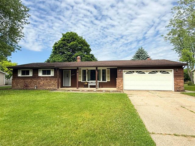 front view for 11477 Colonial Woods Drive, Clio, Mi. 48420