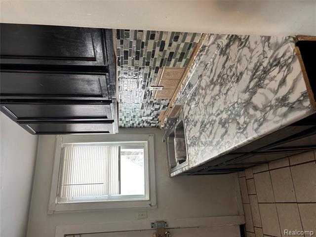 Builiding view six for 1205 Stocker Ave, Flint, MI. 48503