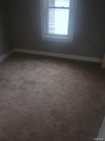 Builiding view twenty one for 1205 Stocker Ave, Flint, MI. 48503
