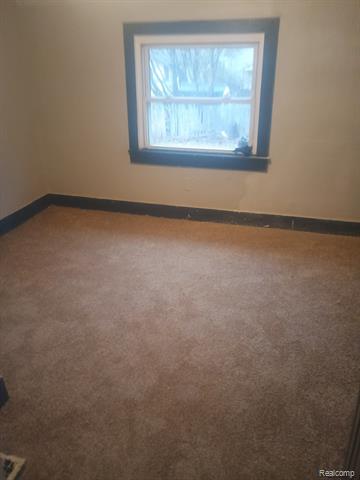 Builiding view twenty for 1205 Stocker Ave, Flint, MI. 48503