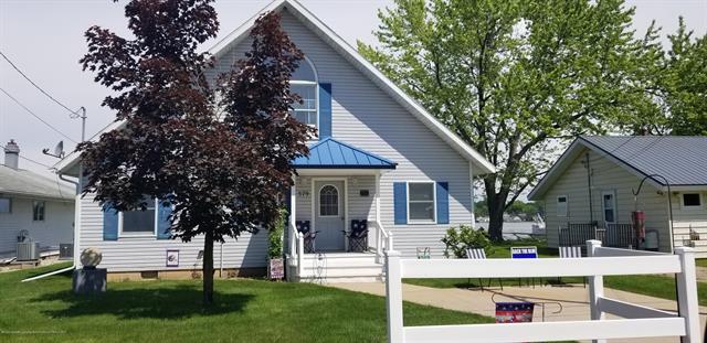 front view for 579 Eagle Point Road, Lake Odessa, Mi. 48849