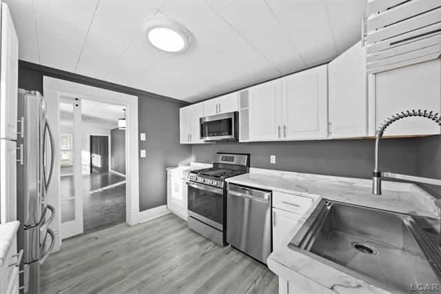 Builiding view eleven for 313 Rice, Adrian, MI. 49221